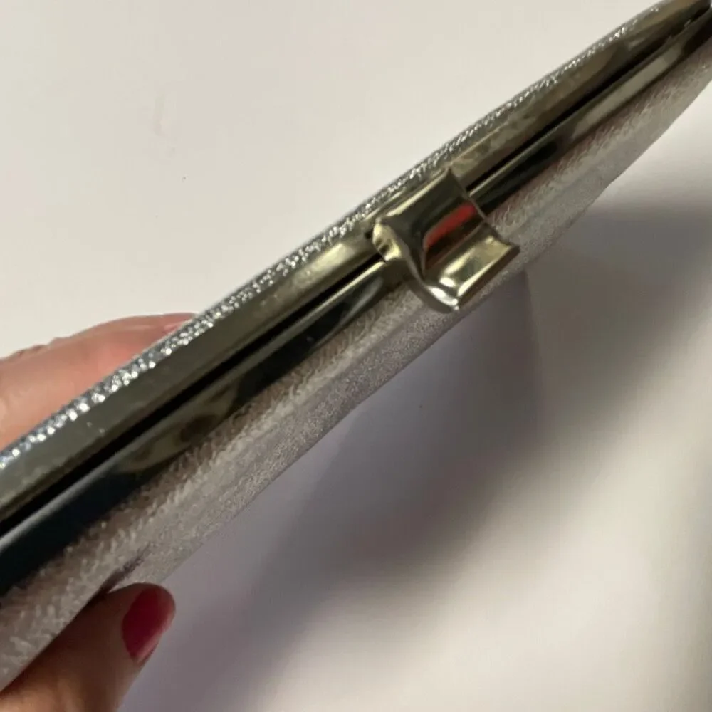 Vintage silver clutch with chain handle. Silver metallic